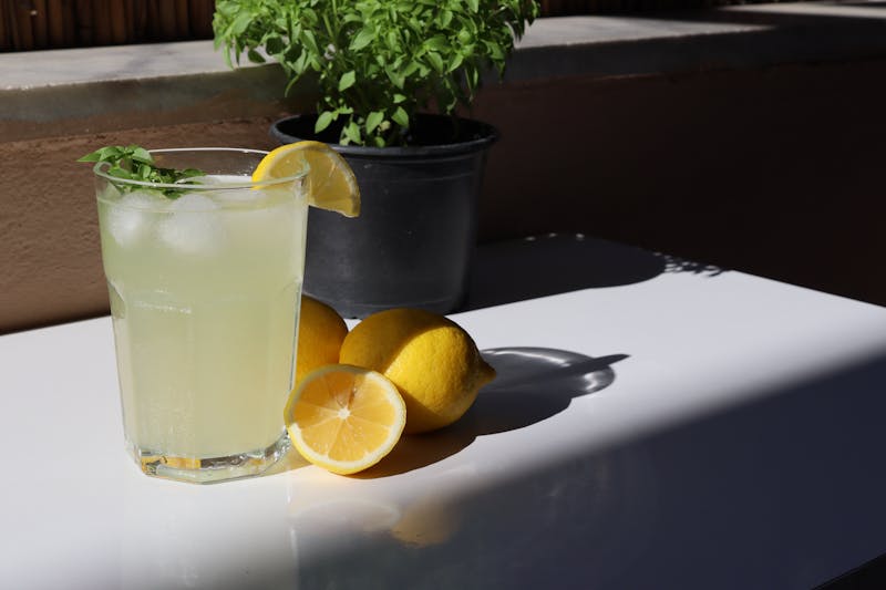 Freshly squeezed lemonade in a tall glass with mint